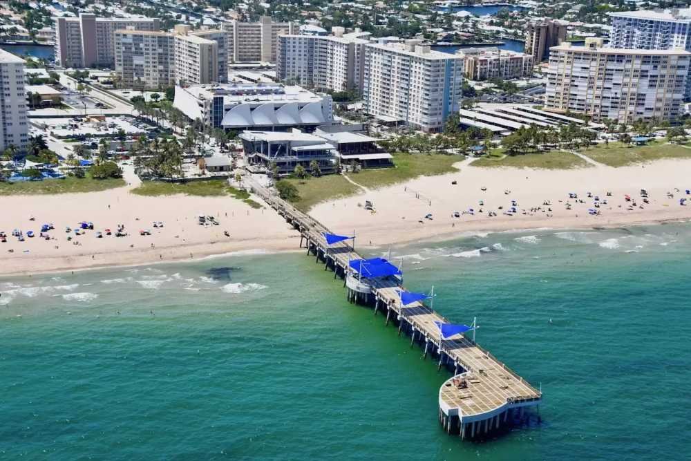 Pompano Beach pier aerial view with turquoise water